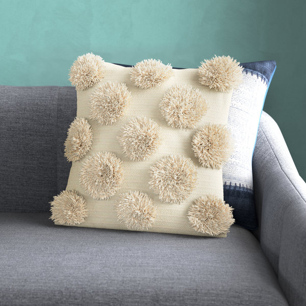 White pillows 2025 with pom poms